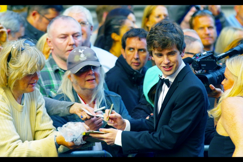 I... also have no idea who this is. I'd say he's probably just some newly minted youth icon, but given the people desperate for his autograph, I'm not so sure.
