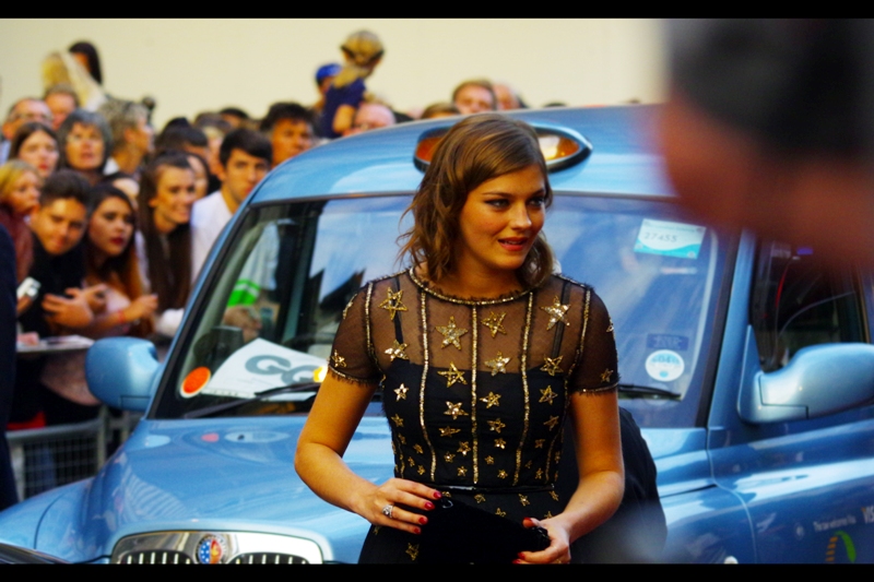 She's pretty - in a nice Marion-Cotillard-meets-Kirstent-Dunst way (which is a good way!)... but once again I have no idea who she is, and I'm going out on a limb and saying she has no idea who I am. I'd make a move, but in amongst this crowd it probably wouldn't go down well.