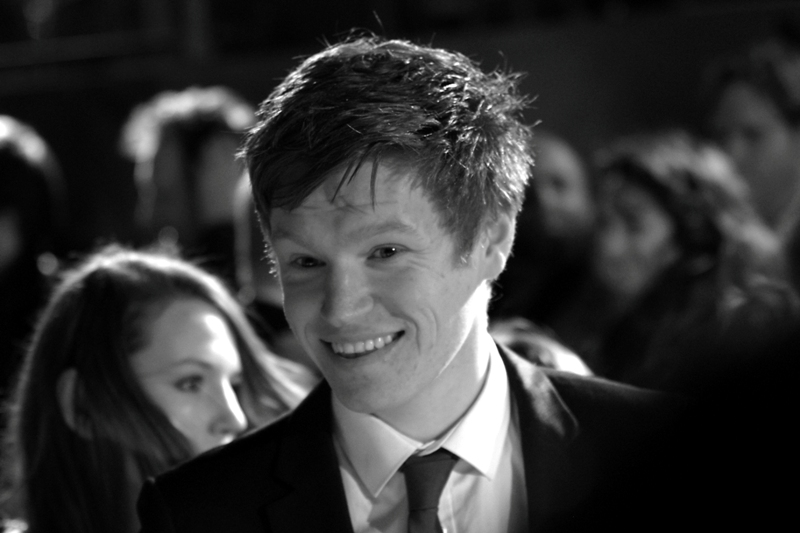 Not sure. One of the little kids from Harry Potter, now aged in his mid/late twenties?
