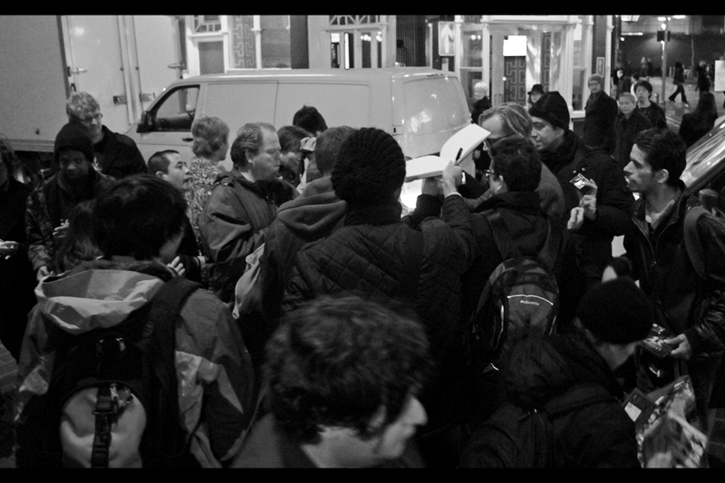 This.. is not a premiere. This is a mugging, but with a sharpie pen and a man's semi-acquiescence. He's in there somewhere, hopefully unharmed.