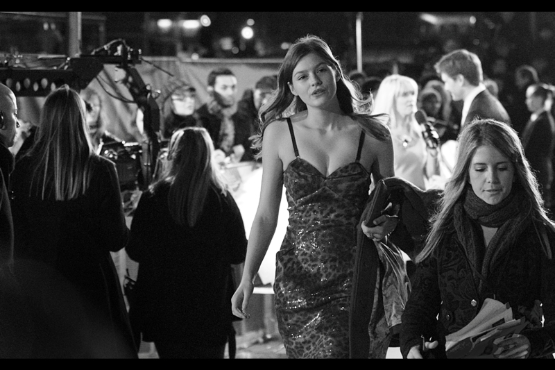 She's not in the film, but she's got walking down a carpet correct to a T. (Wearing a jacket when it's 4 degrees outside is her next challenge) (using a flash occasionally is mine)