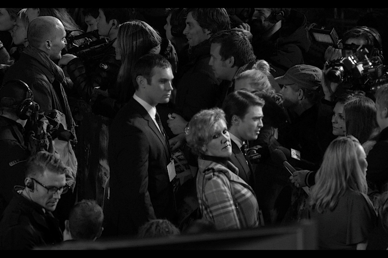 The lady guarding Daniel Radcliffe with a deathly hawk-like stare for danger and threats to her charge takes her job VERY seriously. I'm not implying she's actually armed at premieres.. but trained by Ninjas, certainly.