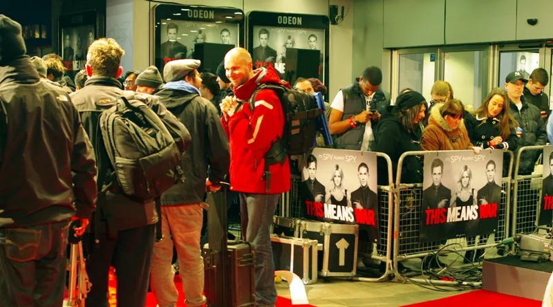 The movie is 'This Means War'. The Paps are lining up for The ID Tag Draw for spots, while everyone in the Pen nearby is probably going Online to check on the chest infection of actor Tom Hardy, who pulled out of all media events earlier today. Eek!