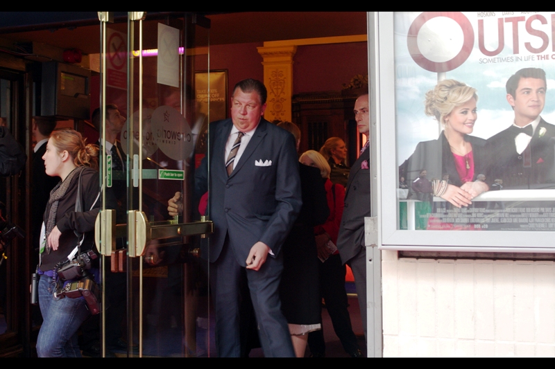 It's not often that I'd look at a guy and say "he's obviously the wealthy financier of the film" . But I don't know who this guy is. He's got a great suit, and he's not the director, and not in the cast. So... totally a wealthy financier.