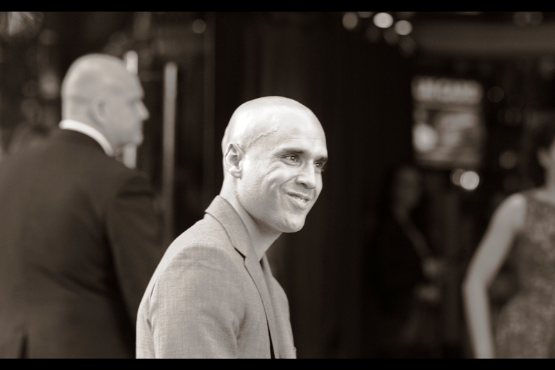 This dude walked into the cinema unnoticed and then was led out of the theatre to the waiting paparazzi, who photographed him. I've since checked wireimage, which doesn't list him, and also imdb.com's entry on the movie, which also doesn't list him. At this point, I think I should add some self-portraits and photos of pigeons