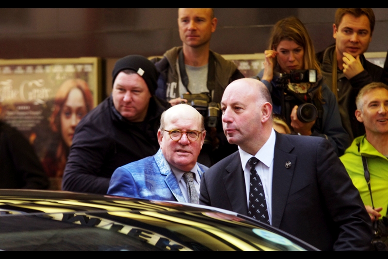 Our first arrival does not appear to be Robbie Coltrane, Julie Walters, Emma Thompson, David Suchet or Derek Jacobi. In contrast to that august group of actors, however, this man (a) came while they didn't, and (b) his suit jacket is pretty awesome.