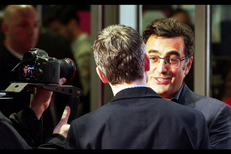 "Once I knew that guy was going to be holding umbrellas at this premiere, I knew I was going to have to come here clean-shaven"