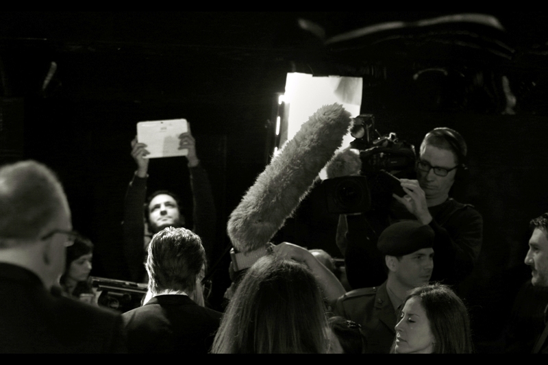 Brad Pitt does a few more interviews, the crush of the teen girls behind and to the side and behind me has reduced to breathable levels, and the guy in the background of this shot really REALLY wants to take that photo with his iPad.