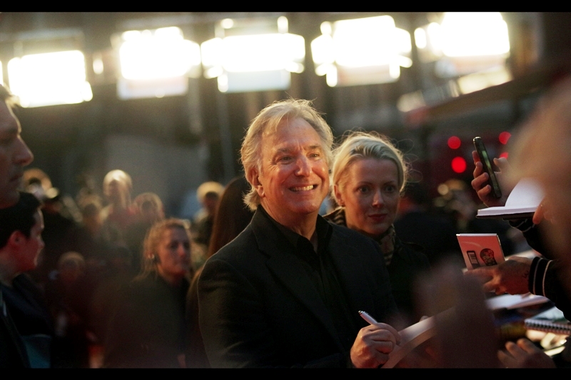 Alan Rickman almost but not quite manages a smile at the premiere of "A Little Chaos"
