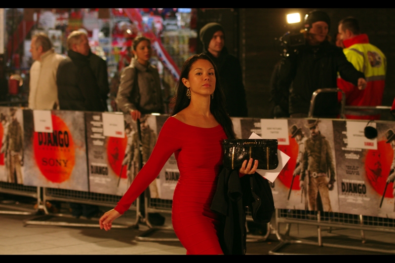 By this time Kerry Washington had gone into the cinema, and everything had (sadly) calmed down a bit. So... here's a lady in a red dress. A few frames later she gave a half-smile in my direction, but if I'm honest I don't mind the pout. No idea who she is.