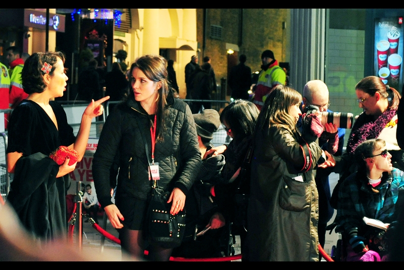 "I'm not actually in this movie, I'm just pointing my finger at you so that attention is drawn away from your prettiness and my dubious social status" Anthropologists will also find much to enjoy when people-watching at a London film premiere.
