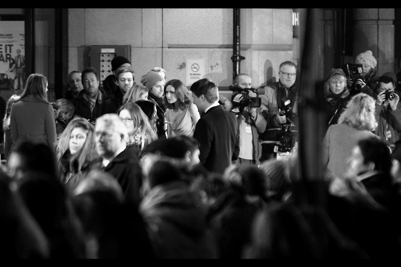 In the far distance, Rose Byrne looks uncertain. I've shifted position away from the mutant crush of the autograph dealers and found a perch about forty meters away from the press photographers, shooting into the light. (Why yes, in almost every respect, I'm very much like Jeremy Renner's character in The Avengers!)