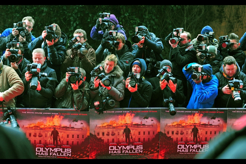 I suppose it's slightly ironic and/or fitting, given the name of this movie, that there are no Olympus cameras in the lineup of press photographers. I shoot Pentax, by the way.