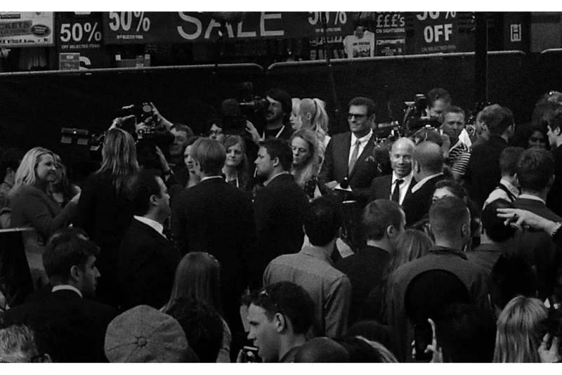 Director Marc Forster does not stand still enough at thirty meters for me to catch, zoom and crop a 10mm wide angle shot of him that's razor-sharp. But I try. I've photographed him before - at the premiere of Quantum of Solace, which he also directed.