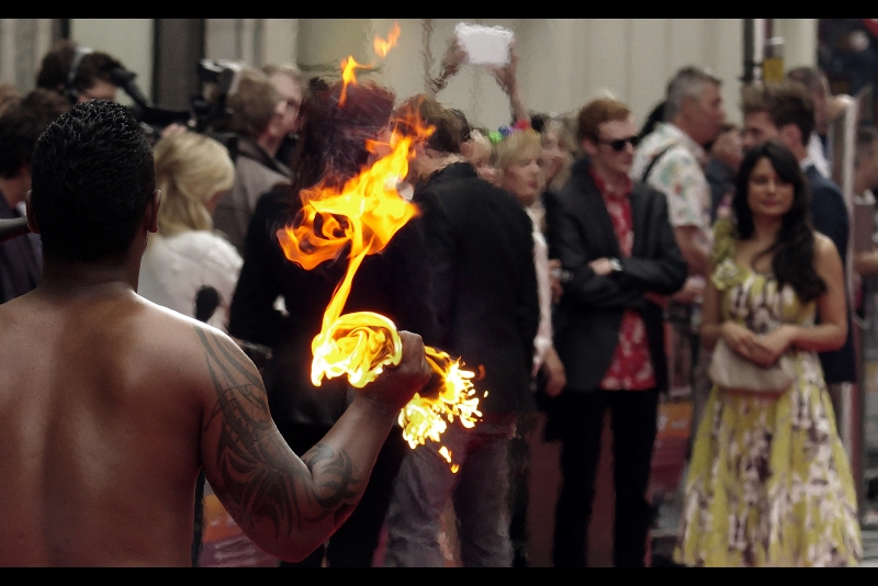 We're slowly getting into the meat of this premiere, as things are set on fire and people are walking around without t-shirts on.