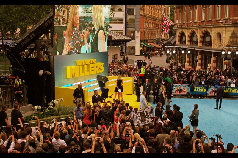 Like me, the crowd is finding frustration in Jennifer Aniston being physically blocked by DJ Edith Bowman. I have about 4 more units of alcohol in me than the majority of the crowd, but unlike them my camera has interchangeable lenses and I can switch between them with a practiced confidence that has nothing to do with alcohol intake and everything to do with skill and the fact that ambient noise in the pub would make the gnashing and splintering sounds of misaligned contacts difficult to hear. I'll let you know how I did next premiere when I try to use those lenses.