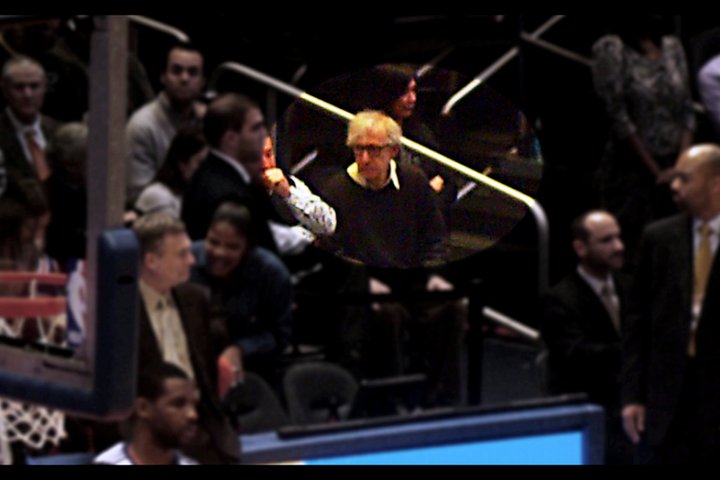 At extreme zoom in the darkness of the crowd, I'm happy enough with this photo of Woody Allen.