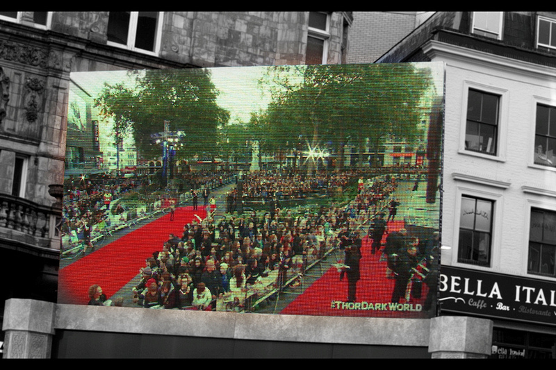 To give you a partial idea of the scale of this event, the giant hammer (shown earlier above) is on the right, and the giant wedge is one of two segments of Leicester Square open to the public, while the thinner bits on the side (one shown, one not) was for the first 500 people in the queue to get in (the earliest arrivals camped overnight. I did not). My position was on the middle/lower left.