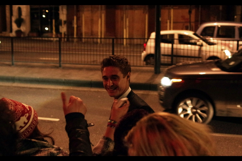 ... and I don't know who this is. He did end up hugging the girl with the knitted beanie though. (Did he similarly hug Mark Strong? Unconfirmed)