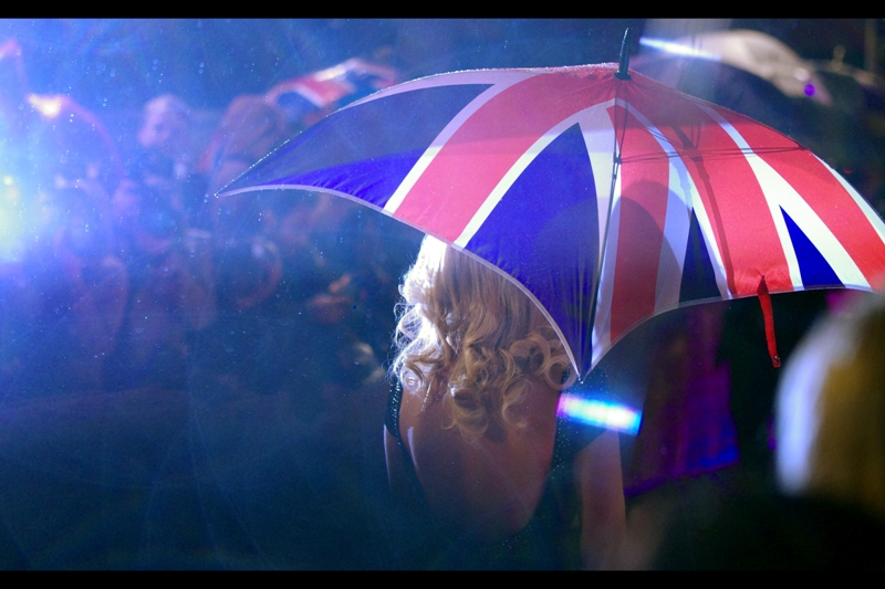When my lens gets very wet at premieres / events, I'm often torn as to whether to wipe off the water, or ride the weird optical effects caused by droplets and flash.... I think I'll ride it out.