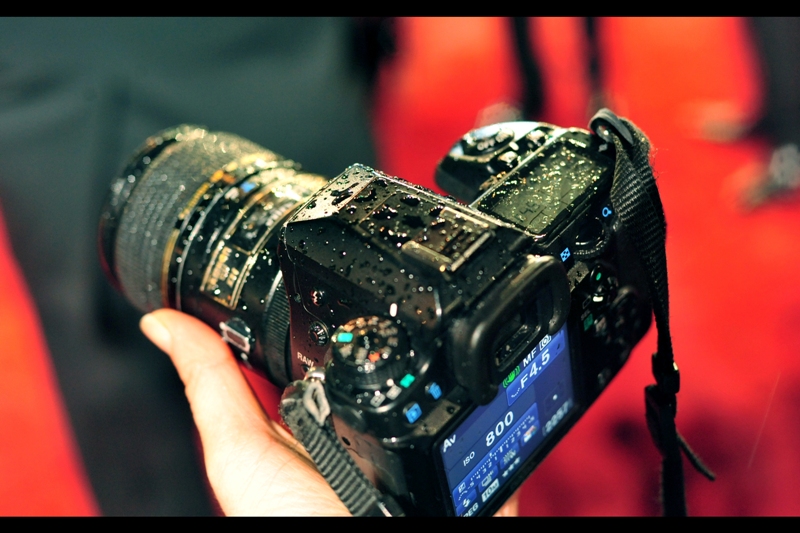 By way of update, this was one of my two cameras – the Pentax – about 20 minutes into the Red Carpet event. This was well before it began to sleet, and ultimately snow. The camera’s fine. I put it in front of the heater back in the apartment when I got home. I also have a Nikon, but it pulled about a quarter of the duty of the K5 at this event.