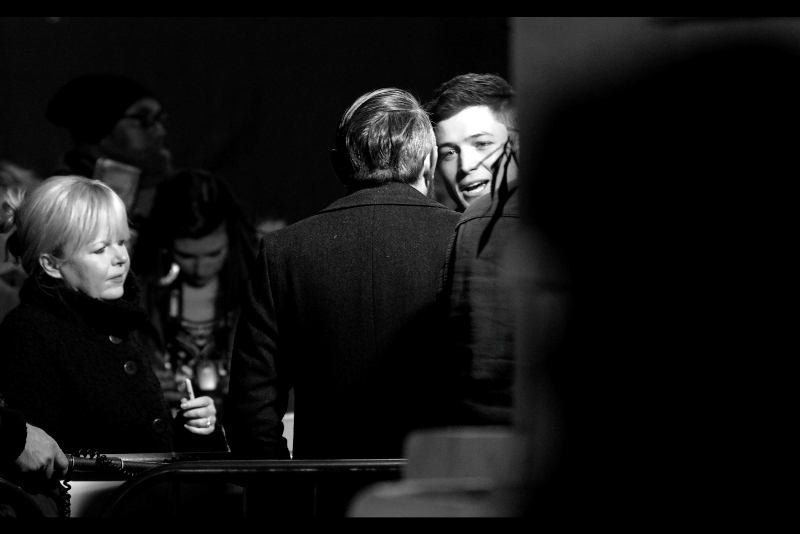 Sometimes I'm glad I'm pessimistic enough to shoot three-quarter profiles at thirty meters partially obstructed by park statues.... because sometimes you don't get a better chance at photographing somebody at a premiere. This is doubly annoying as the actor is Taron Egerton, arguably the lead in this film.