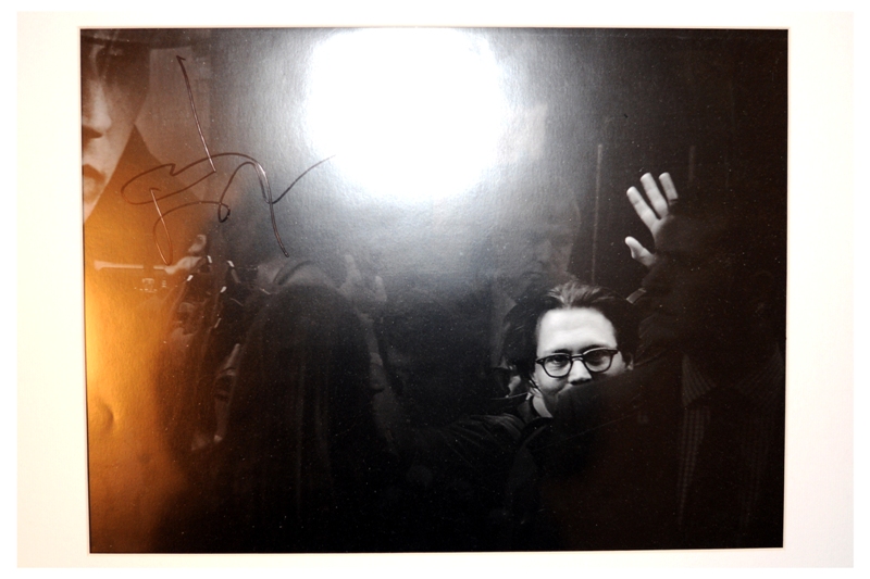 YAY! Sure it's not the best photo (and it's black and white so that artistic blue and yellow from the flash is sadly not a permanent feature of the image) but it's a Johnny Depp autograph on a photo I TOOK! (I'm so lonely..) Oh, and he even complimented me on it! What he said was: