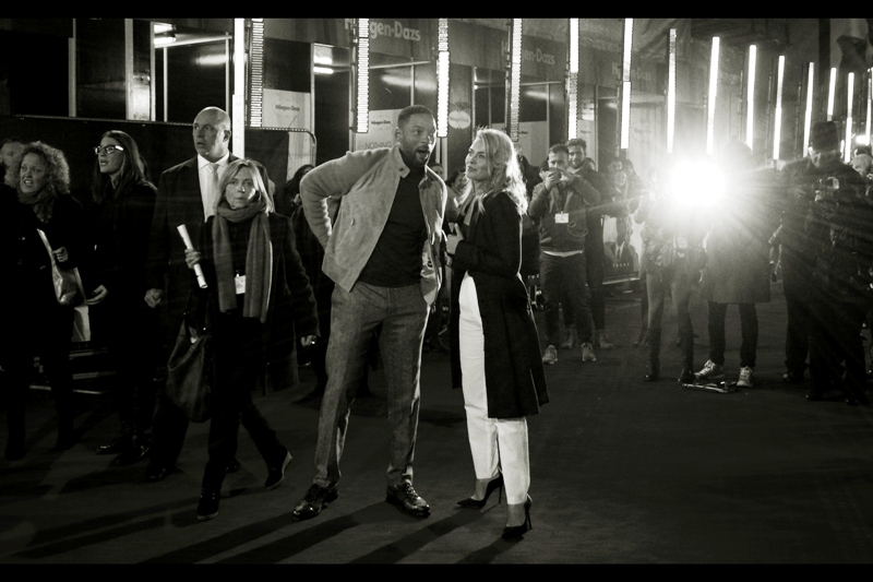 By now, Will Smith has finished doing interviews and high-fiving the crowds and kissing-babies and blessing expectant parents and has joined Margot Robbie for (hopefully) an interview on the Giant Albino Oreo.