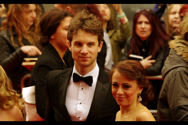 I'm going to go out on a limb here and suggest that his hairstyle took even longer to put together than hers did. That 'artfully toussled' look isn't easy to accomplish. (more so with my hair, given how little of it there is, but that's a side-matter)