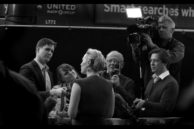Apologies on the less-amusing-than-perhaps-usual commentary. I'd been deprived of my step-stool at ths premiere, potentially because this country feels that a 30cm elevation at the fifth from of an event presents an unacceptable Health and Safety Risk. To which I can only say that it doesn't matter who wins the upcoming British Elections, this country has already lost. That aside, I kinda like the 'Last Supper' type feel of this photo.