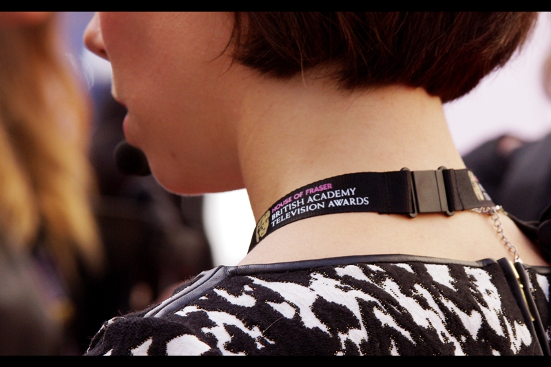 Back to the preamble to this event. My wristband is white, but I'd have traded it for a black neckband with strange curled wiring.
