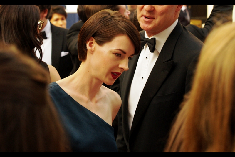 I don't know who this is, but the geometric precision of her dress is quite something to behold. (edited to add : Jessica Raine)