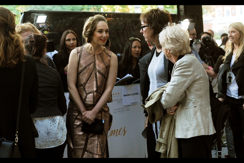 "Pssst.. are those old dudes, like, famous?" If this is actress Hattie Morahan, then she's in this film. If not... then I've been distracted from taking yet more photos of Sirs Ian McKellen and Patrick Stewart by something shiny.