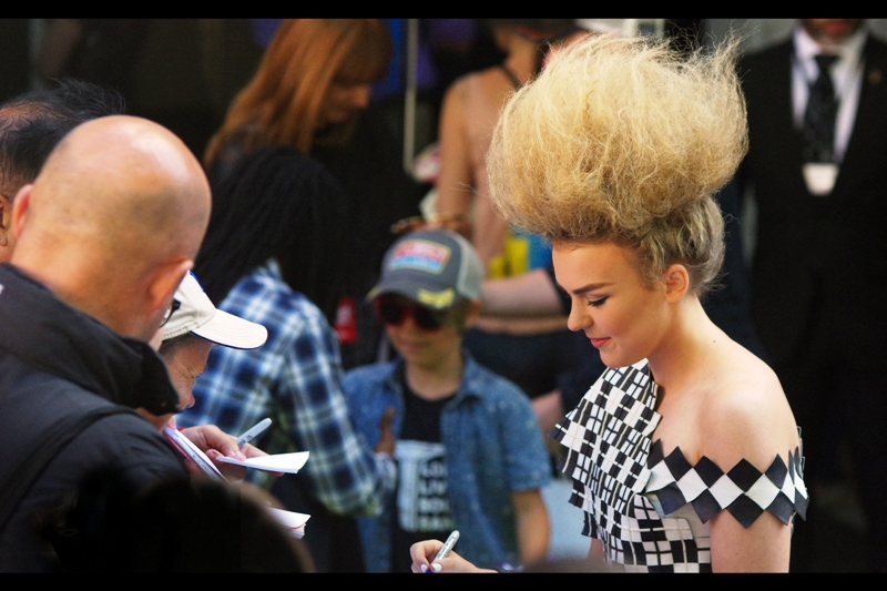 "Here's the number of my hair-dresser. I'm not sure what he's going to be able to do for your bald friend, though.."