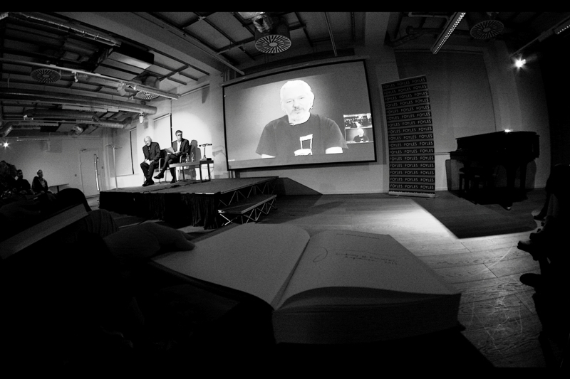 I'll leave it to you to theorise which one (or combination of) whether I'm a wikileaks sympathiser, I like reading books, I like photographing events, or I am a closet fan of graphology and really want to analyse Julian Assange's signature are the specific reason(s) for me being at this event.