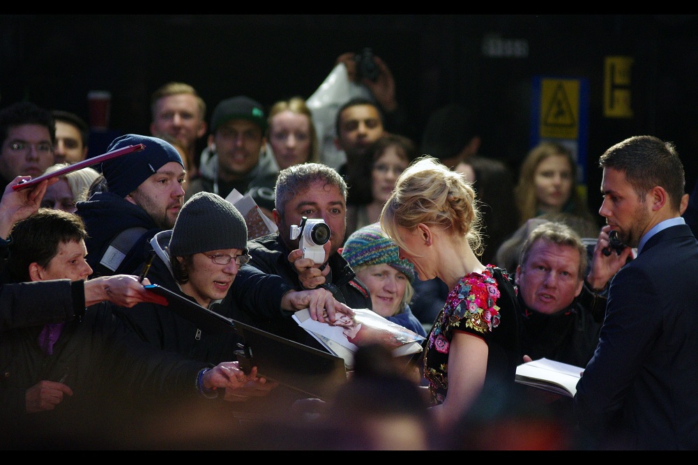"I'm fairly sure that's not a picture of me, but rather Nicole Kidman" "Holy crap... you may be right. Could you sign it AS her, though?"