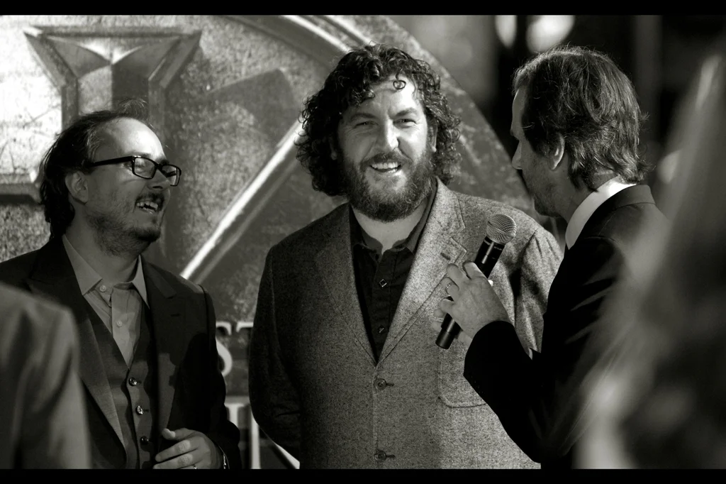 The director rushes to the stage to laud and applaud the film's visual effects supervisor Nicholas Brooks. (possibly for his skillz in visual effects and not, say, parallel parking...or making a mean bananabreadcakeslice.)