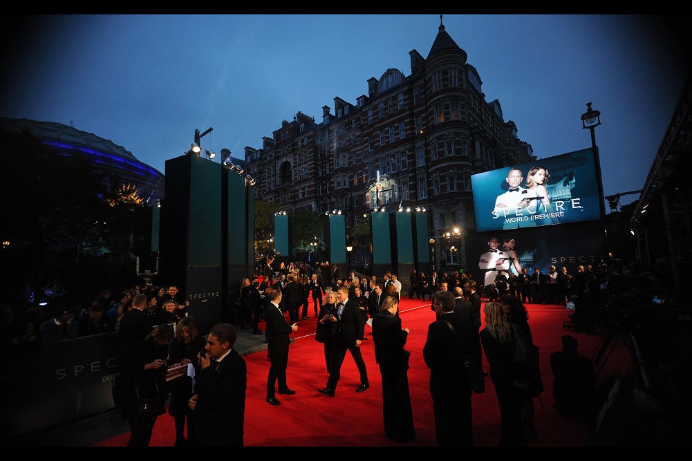 T-Minus 1hr. It's getting real, now. And those people standing and milling between my view and where the stars will pose in front of the Paparazzi... they're looking a bit too real, now, too.