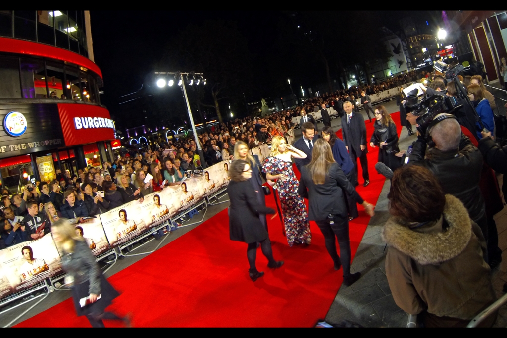 A personal assistant has run out to tell Bradley Cooper and Sienna Miller that they have about four (4) minutes to complete about six interviews. Time to hope nobody asks anything complicated requiring more than a few syllables.