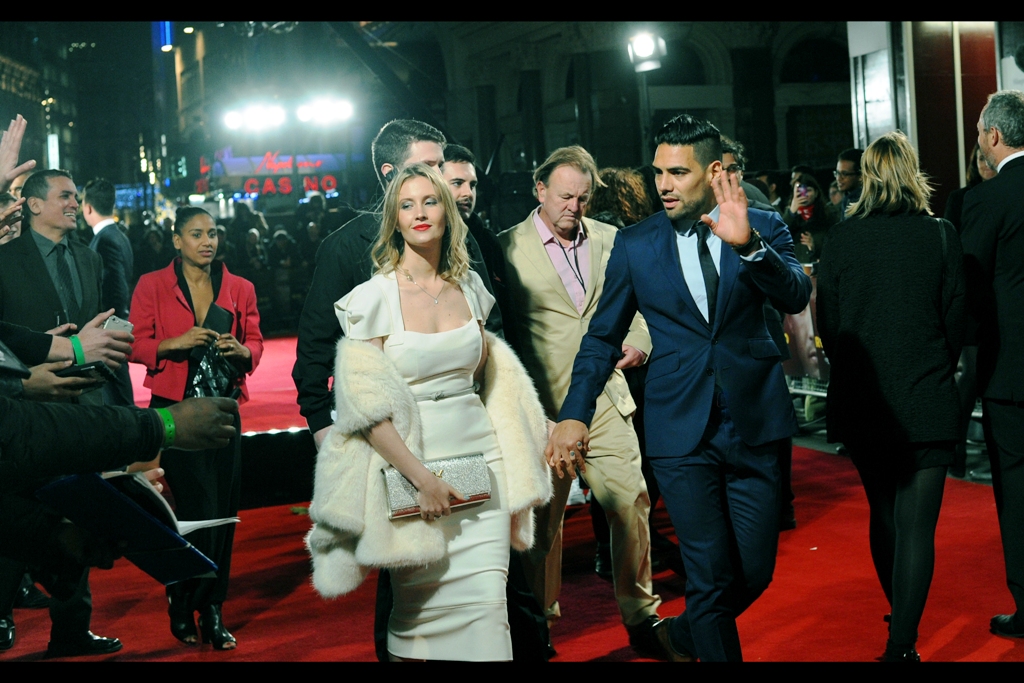 Wireimage informs me that these two are Radamel Falcao and Lorelei Taron, and while I could probably guess as to which one is which, right now I'm too tired.