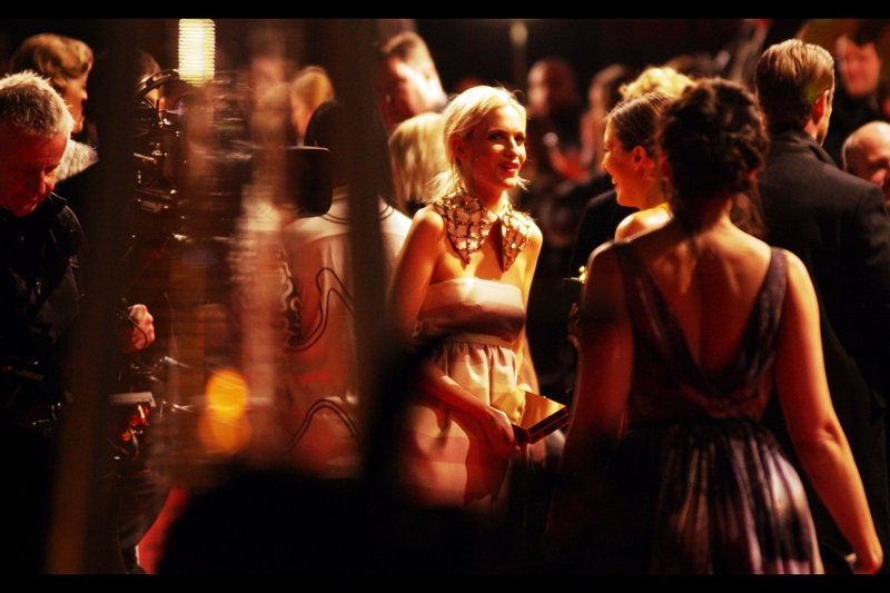 I'm not sure who this is ( Poppy Delevingne? ) but the "blurry-therefore-art" movent will not be stopped at this event. My camera's limitations, the low light, the heaving crowds and my own artistic intentions demand it.