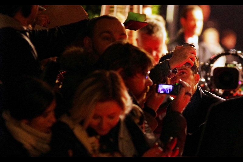 Meanwhile, somewhere under this mass of arms and autograph books and mobile phones is actor Orlando Bloom. Possibly.