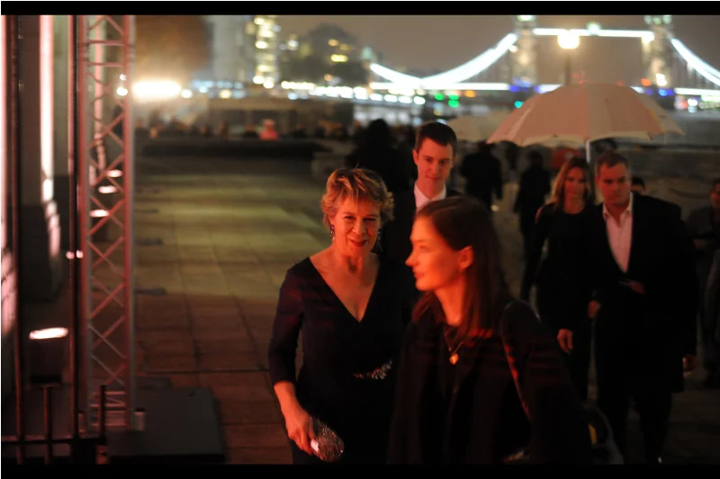 Celia Imrie was in both the First and Second Best Exotic Marigold Hotel films... and I'm glad she took the time to walk around the building she was entering before... you know.... entering.