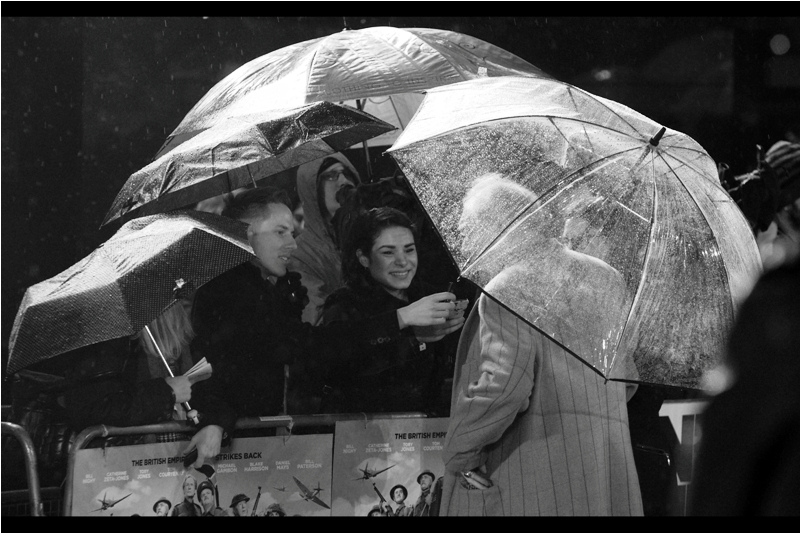 "I'd actually prefer not to answer any questions.... mostly I just came over to congratulate you on this wonderful umbrella igloo you've created"