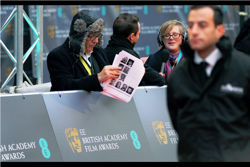 This year's Outstanding Contribution to British Cinema is being given to a costume design house. I wore a sleek black subtly branded blad beanie. This man did not. Still, well done to Angels Costumes.