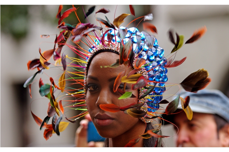 I don’t care how many flightless papua new guinean birds gave their butt feathers to make this, it’s awesome. The rhinestone-studded showercap I can do without.