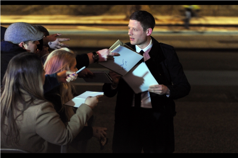 "Wait.. you DON'T want my autograph, you just want me to decipher the scawl of the guy with the hat and tell you who I think he is??" (edite to add : who is James Norton?)
