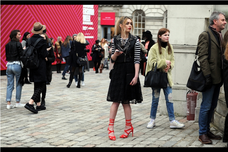 ... looks like standing with your legs weirdly crossed inwards is in this year...