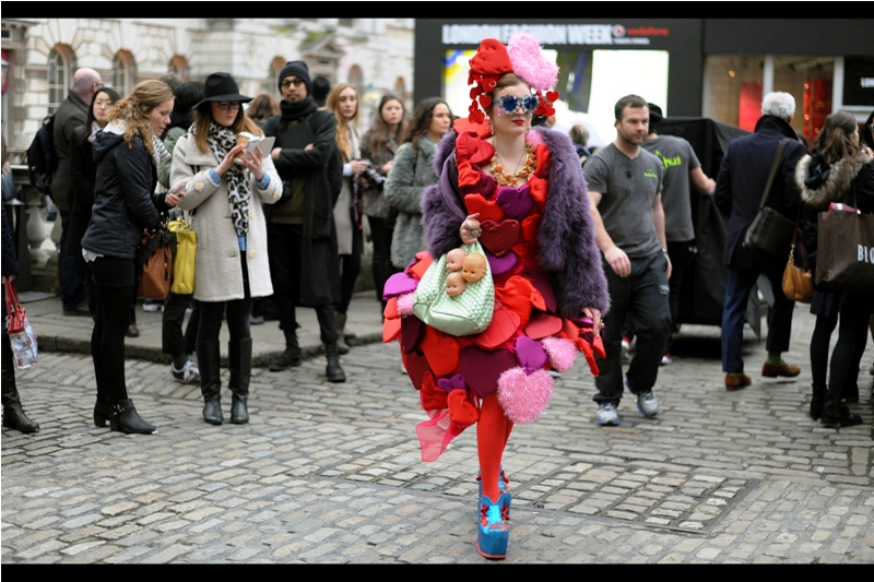 "What's wrong with you people? You'll ALL be putting doll's heads on your handbags before the year is out, YOU HEAR ME?? Mark my words!!"