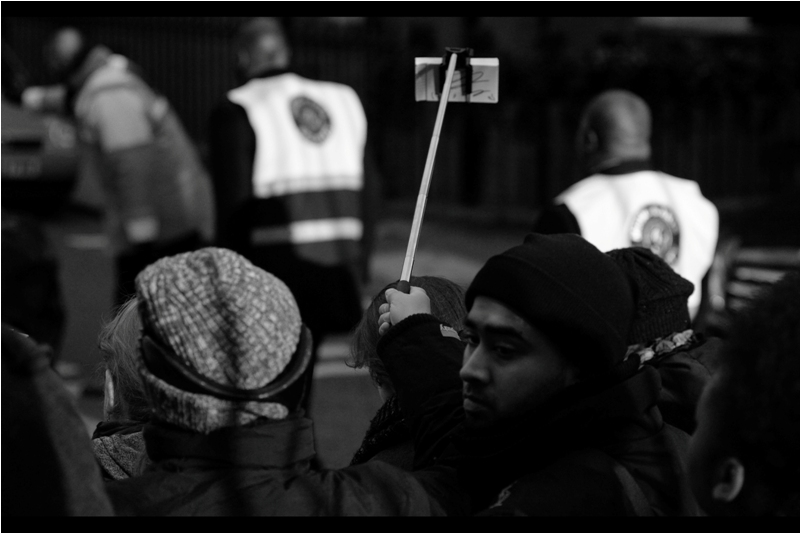 The inevitable evolution of the Selfie-Stick into a 'sign this piece of cardboard I'm holding out well past the barriers' stick. It's ultimately going to be red carpet drones next, people. I called it first.
